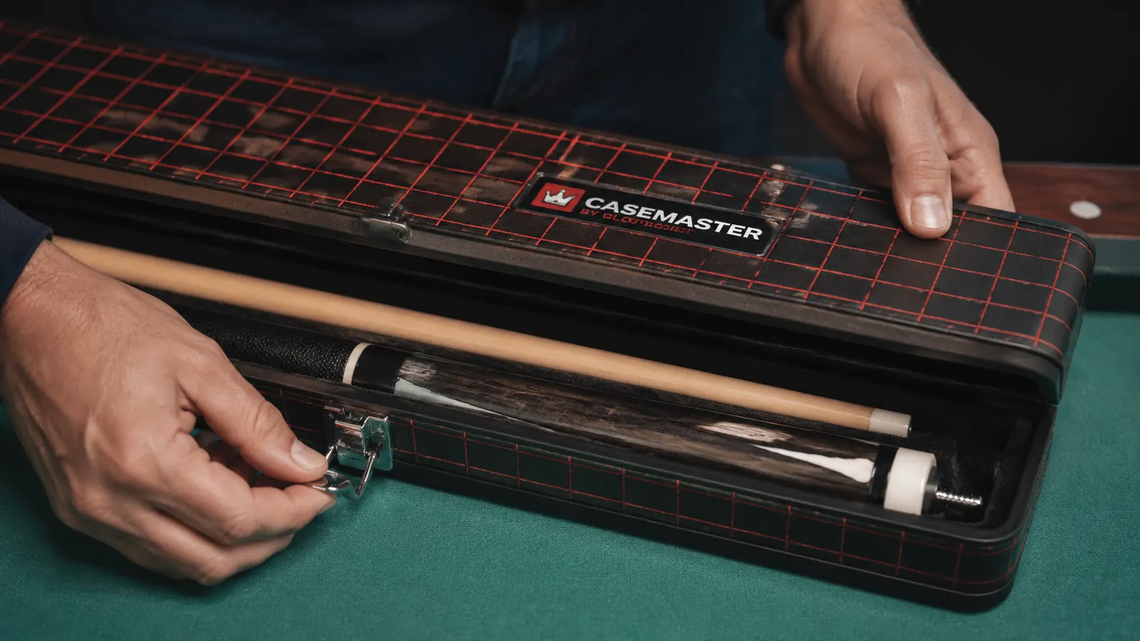 Player latching closed the Casemaster Q-Vault Supreme cue case after storing a two-piece cue