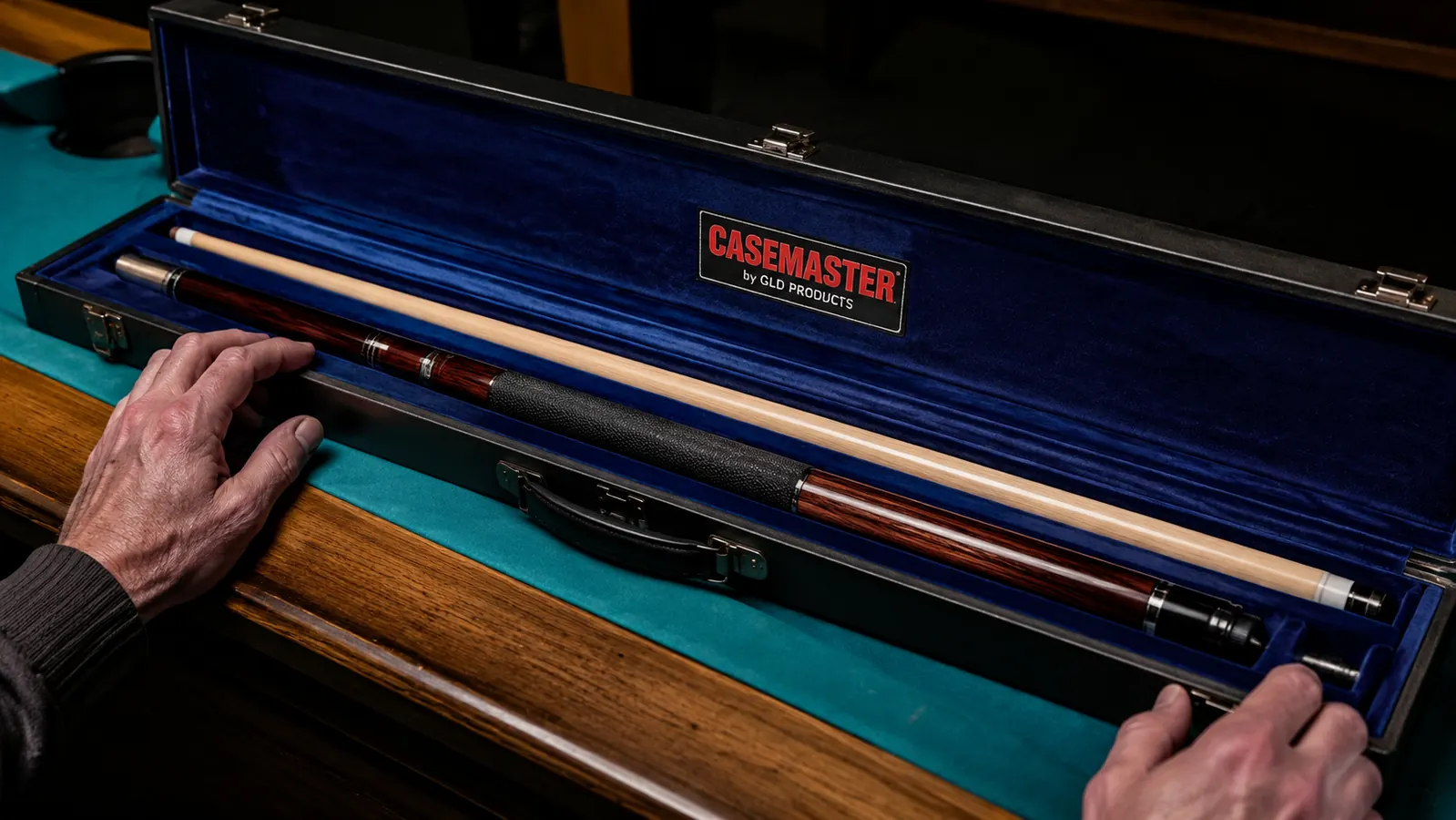 Interior of the Q-Vault Supreme showing blue velvet lining and cue resting inside