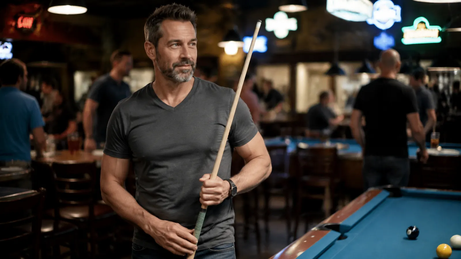 Pool player at a league night holding a new cue and preparing for a shot